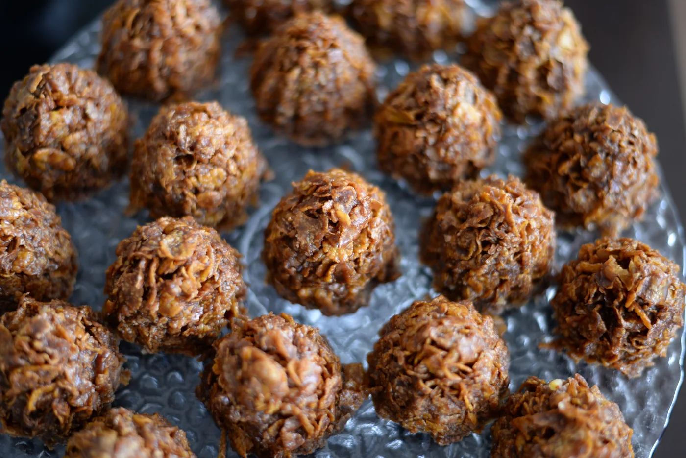 Chocolate cornflake cakes up close, every flake coated in dark chocolate