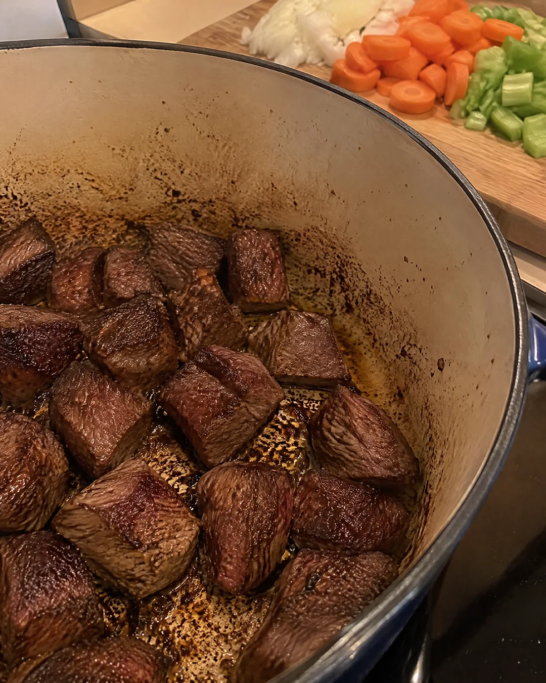 Beef chuck browning in batches in a soup pot