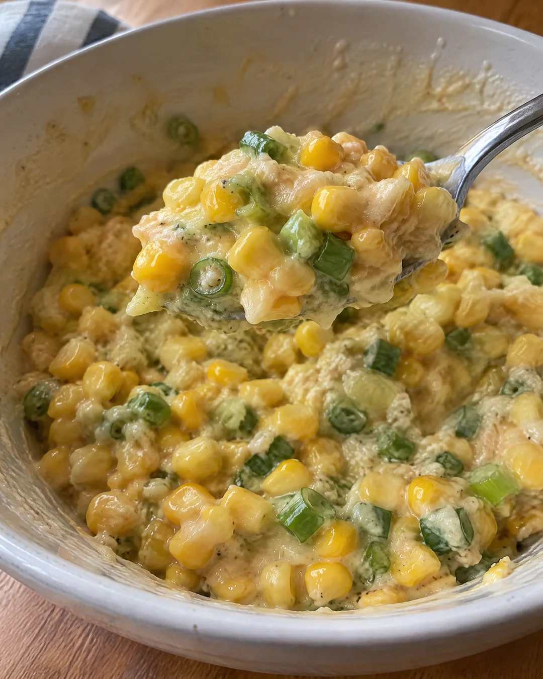 Corn fritter batter with sweet corn and green onion