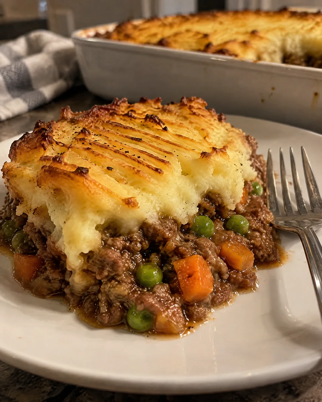 A serving of cottage pie on a plate