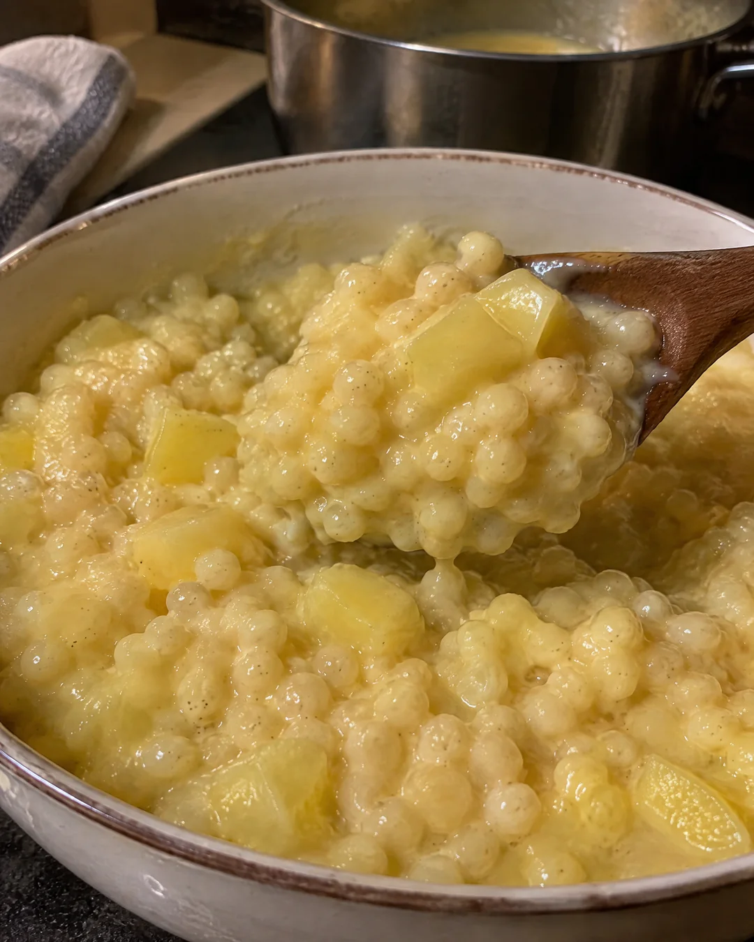Tiny acini di pepe pasta stirred into a thick pineapple custard