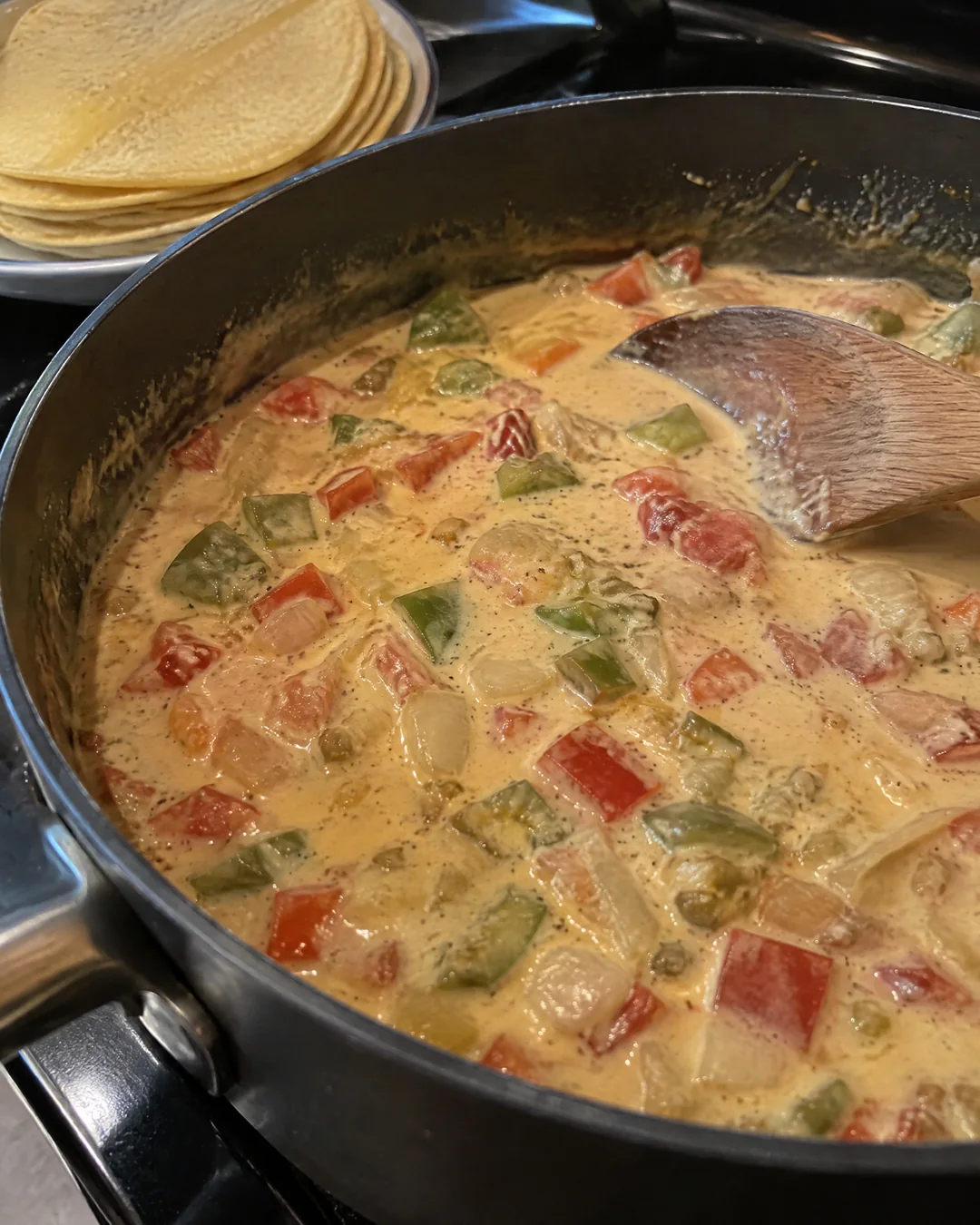 Creamy homemade King Ranch sauce with peppers and green chiles