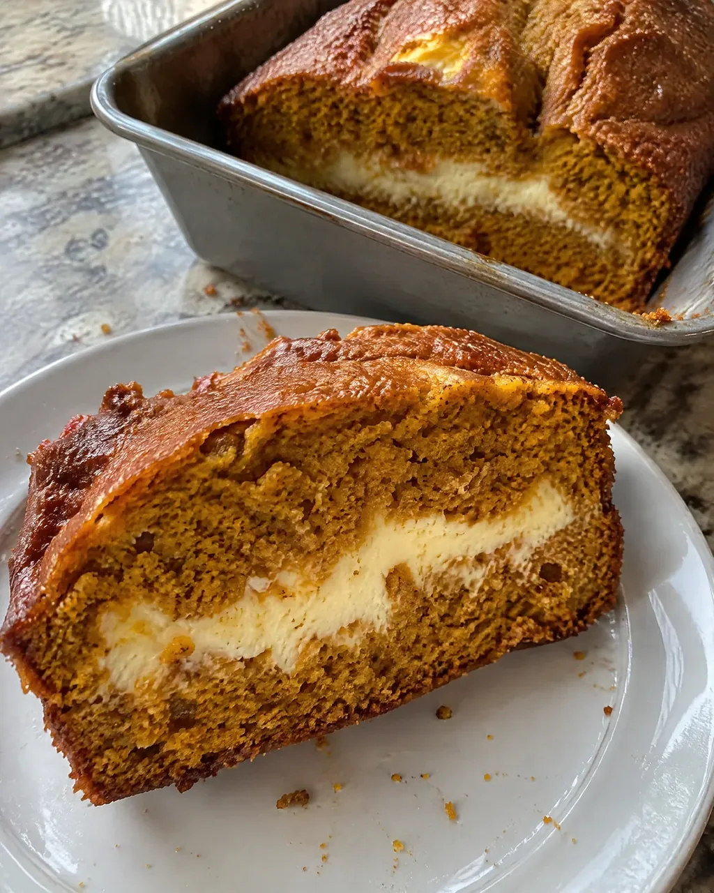Pumpkin Bread with a Cream Cheese Swirl (The Stripe Down the Middle)
